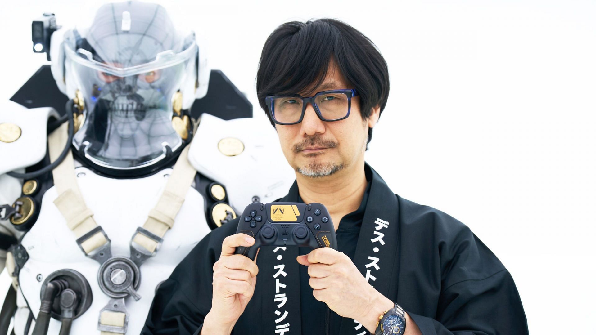 Hideo Kojima himself unveiled the On the Beach DualSense Controller in a promotional event (Image via Sony Interactive Entertainment)